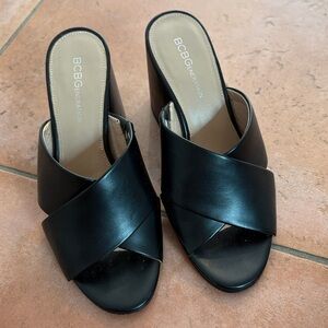 BCBGeneration Black Cross-Strap Wedge Sandals